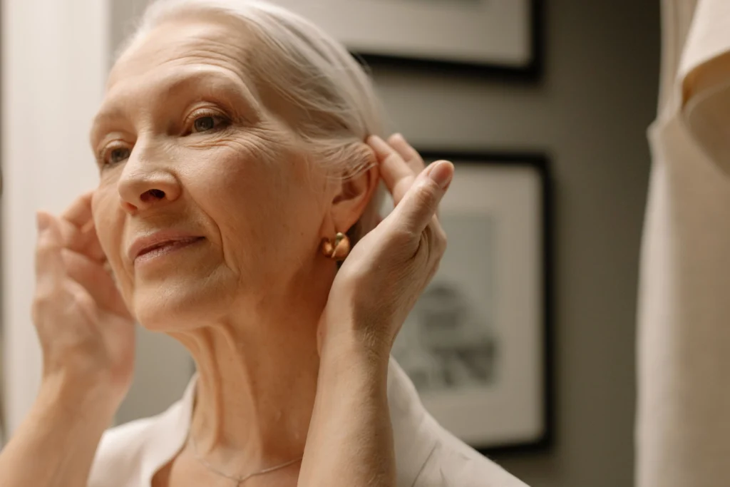 An elderly woman getting a facelift consultation.