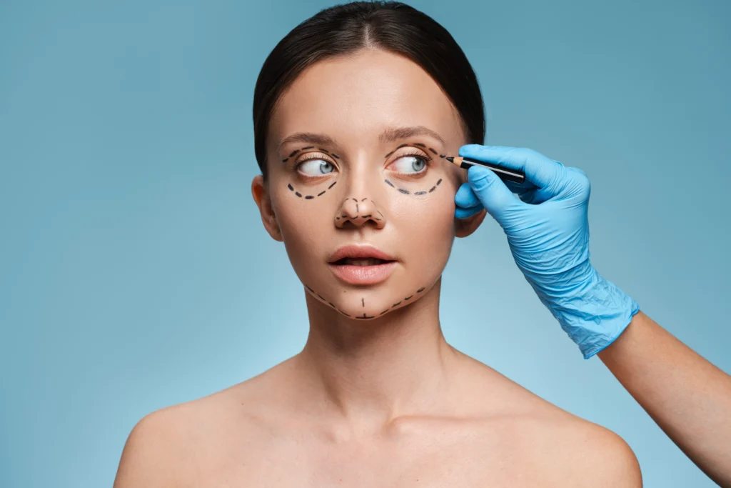 Woman getting assessed for facelift surgery.