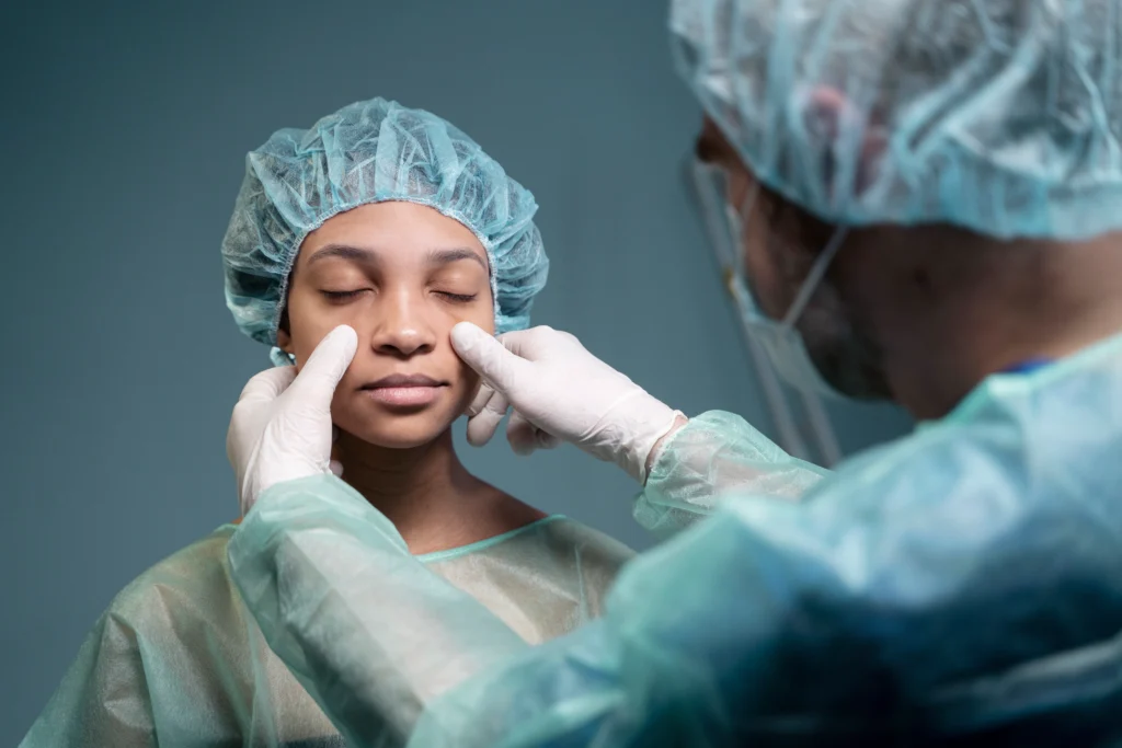 A doctor checking patient before eyelid surgery.