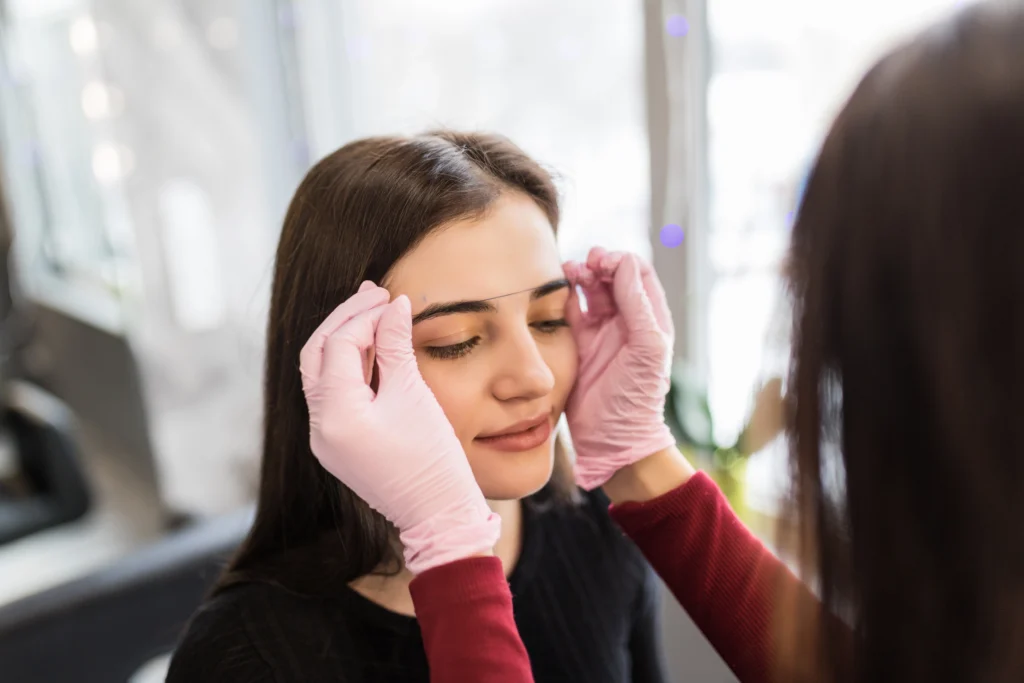A lady getting assessed for double eyelid surgery.