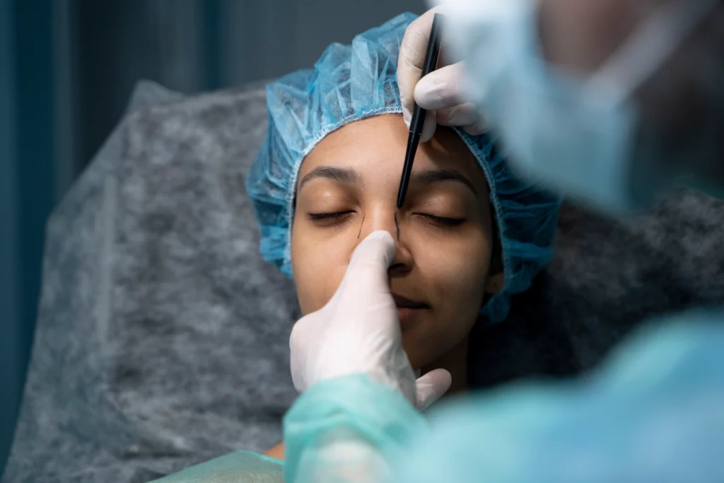 Doctor planning rhinoplasty.